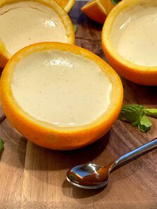 orange posset on cutting board 