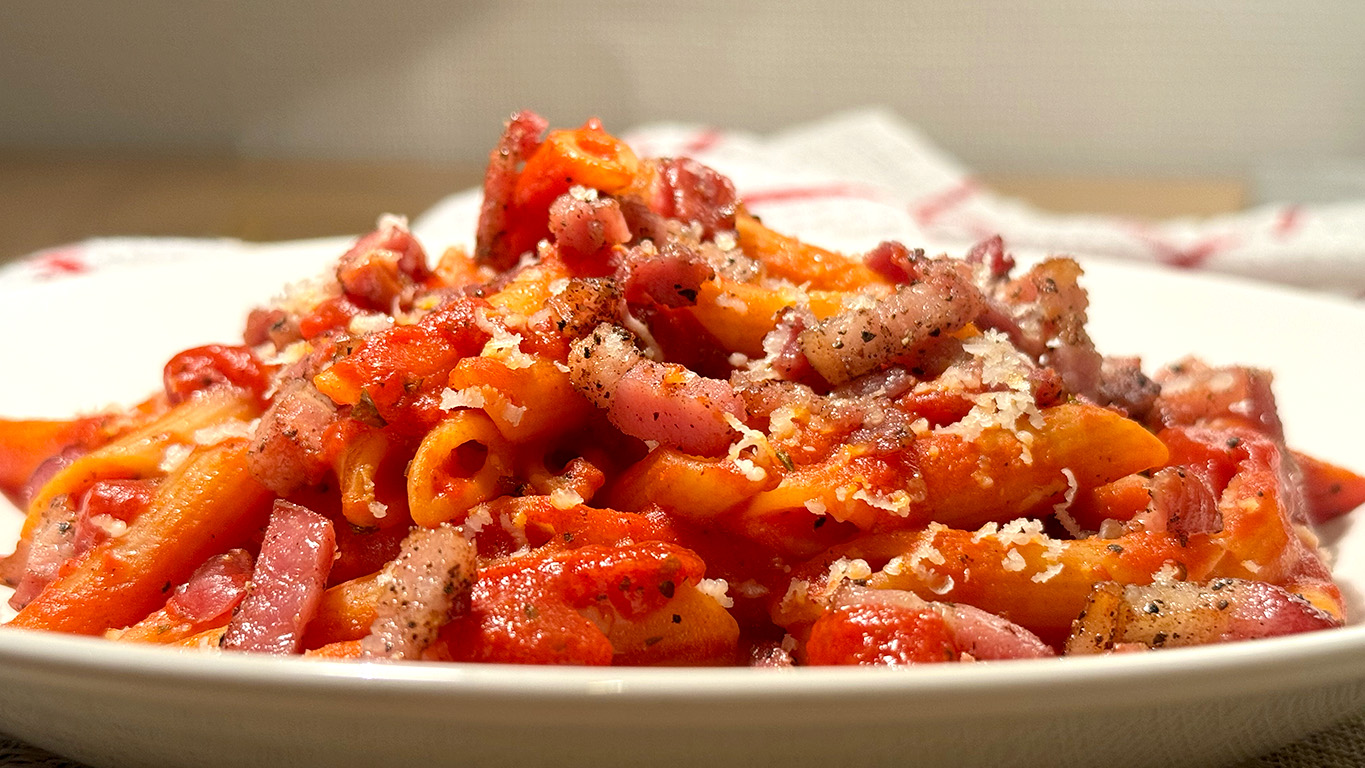 bacon tomato pasta on a plate