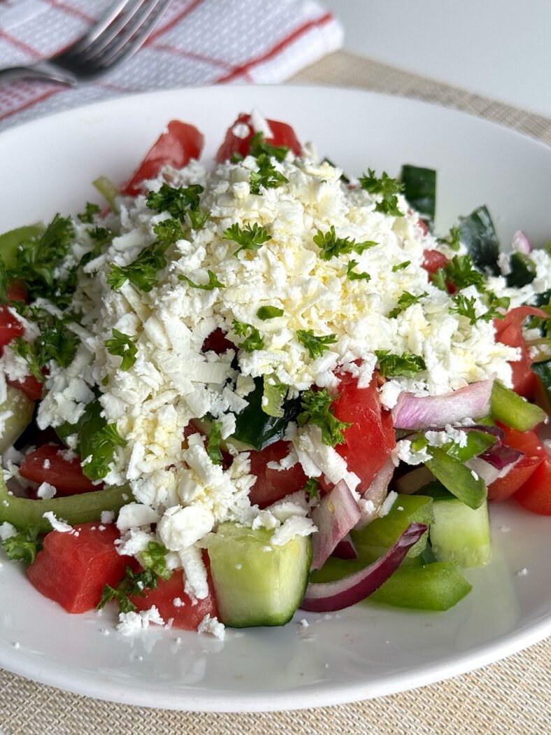 A closeup of a Shopska salad